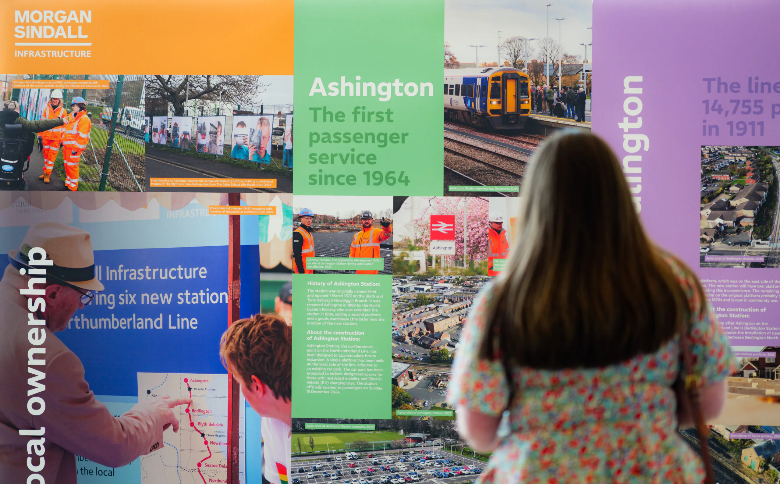 Indoor informational panels showcasing historical data about Ashington station’s first passenger service since 1964 and local ownership initiatives by Morgan Sindall Infrastructure.