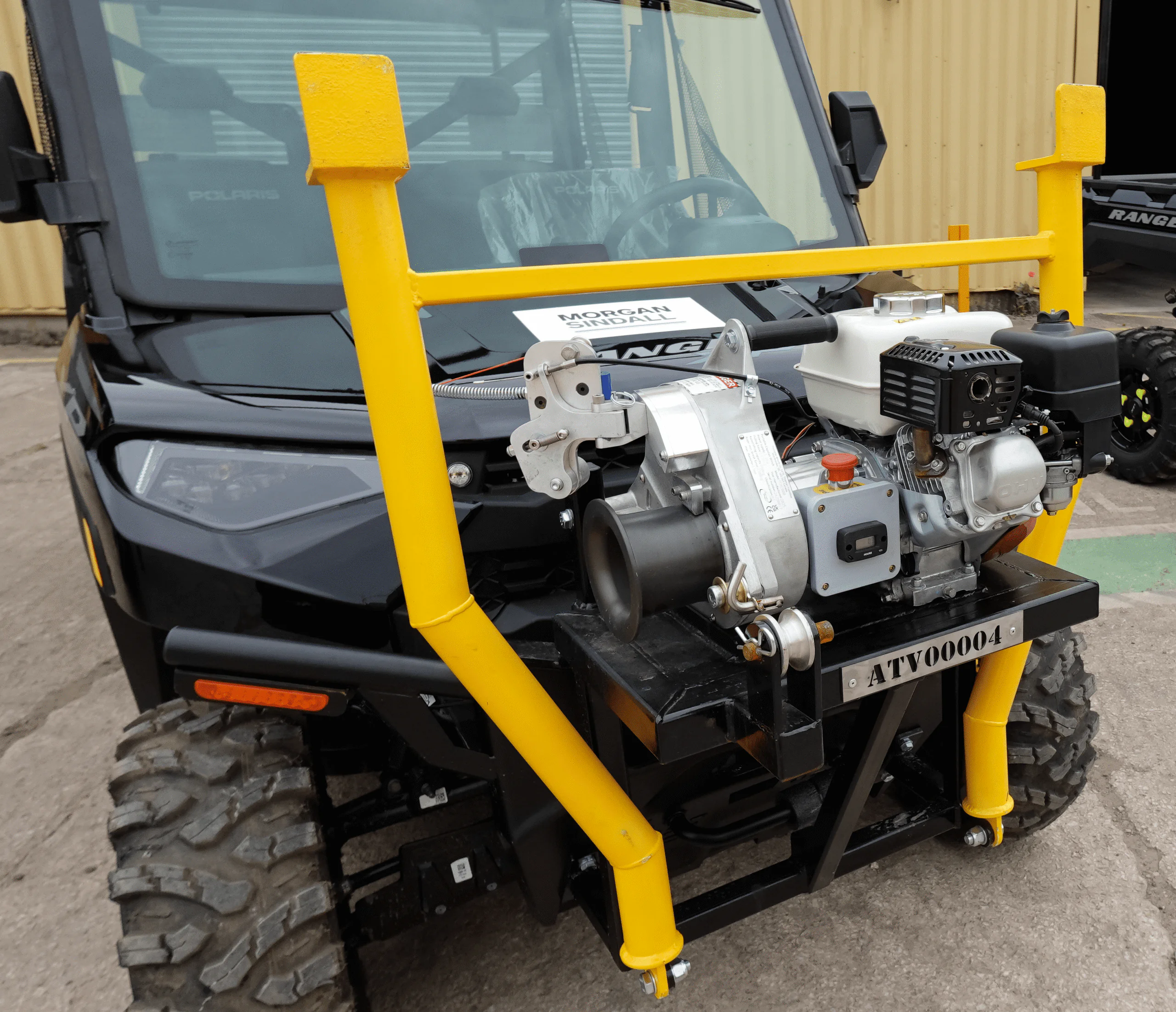 Front view of mechanical equipment mounted on an all-terrain vehicle labeled ATV000004.