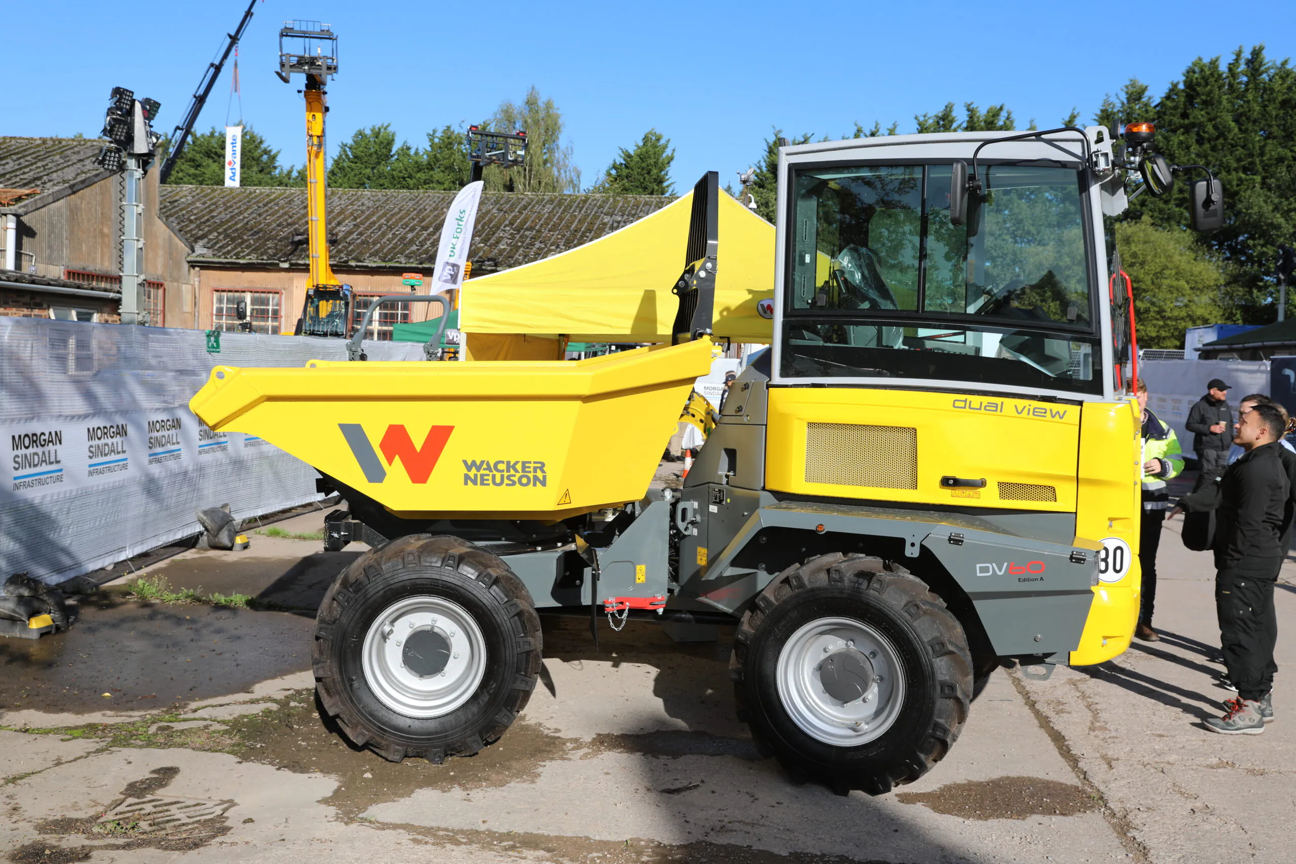 Side view of a yellow Wacker Neuson machinery.