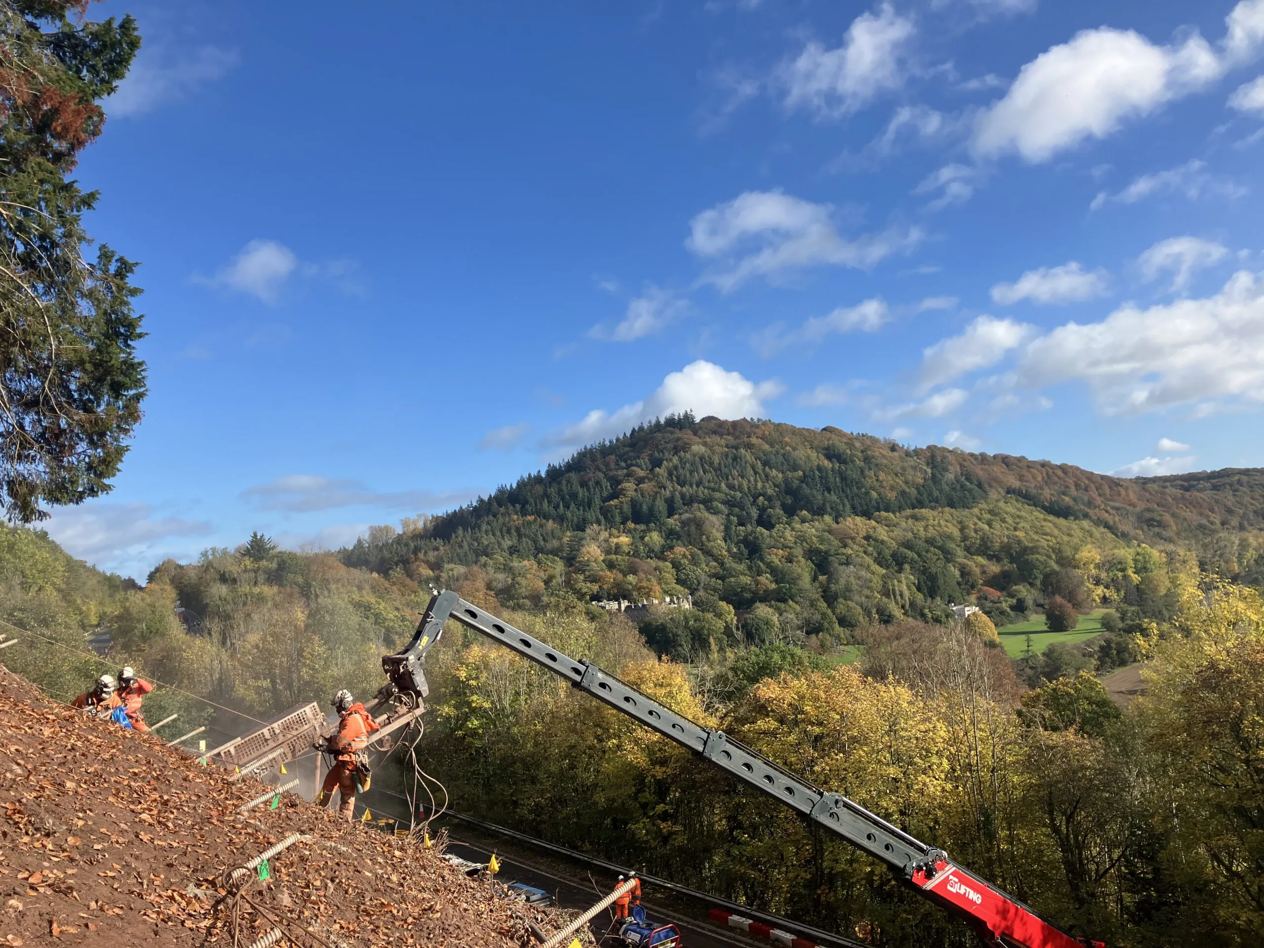 Construction team carrying out soil nail installation on the A40 Leys Bend slope as part of the permanent engineering solution following the rockfall.