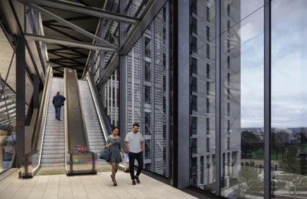 Interior visualisation of the proposed station concourse, showing an escalator, wide pedestrian walkways and floor-to-ceiling glazing. The design creates bright, accessible routes between different levels of the station.